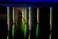 Emerald Reflections Beneath the Bridge